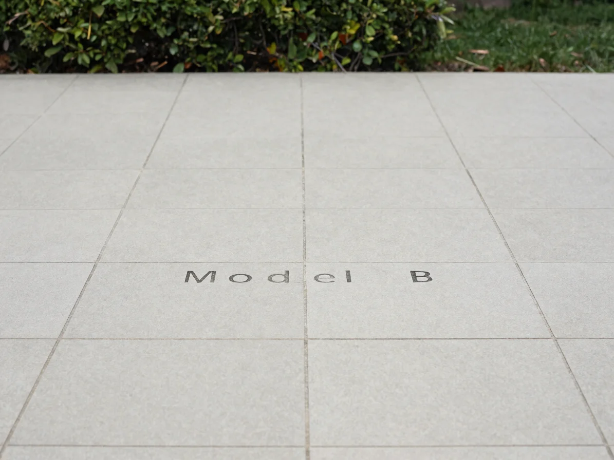 [Placeholder: product image pending] Neutral light grey tile with